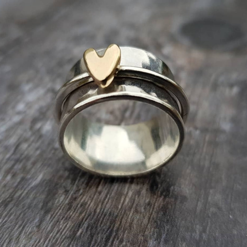 Silver Ring Featuring a Golden Heart