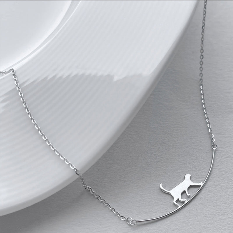 Silver Pendant Necklace Featuring a Playful Kitten