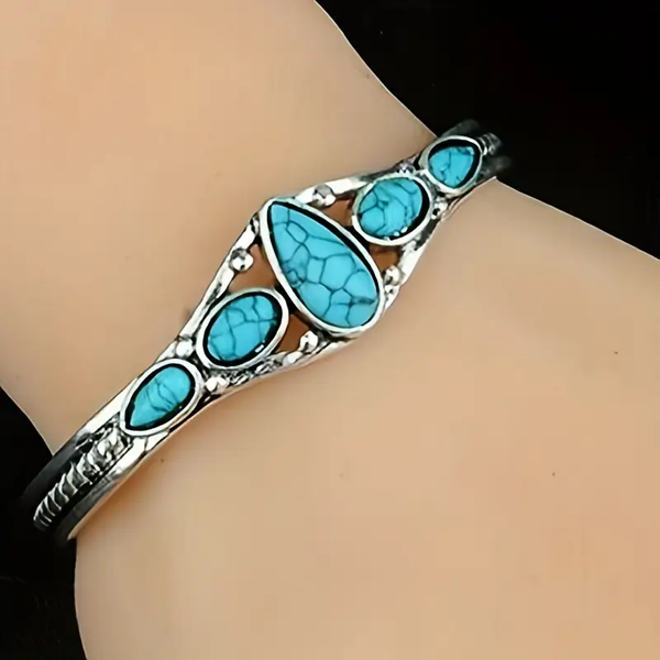 Silver Bracelet Featuring Blue Opal Accents